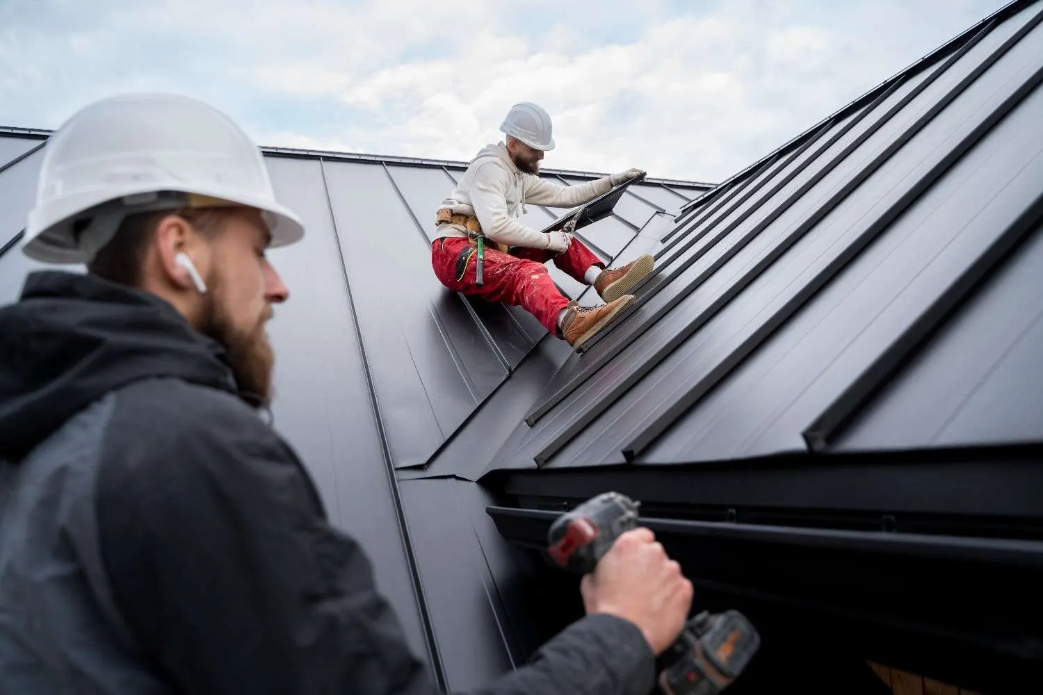 Professional roofing team inspecting a roof
