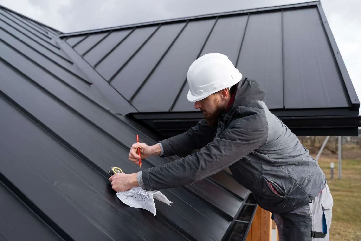 Urban Roof Solutions team working on a residential roof