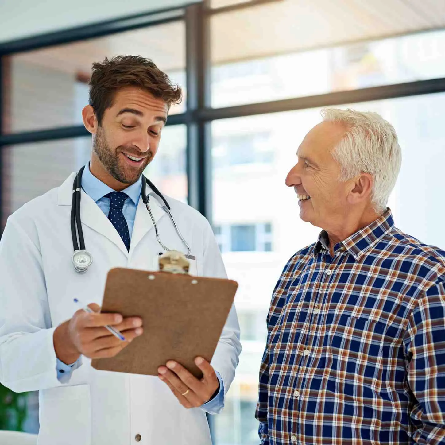 Smiling family discussing healthcare insurance options
